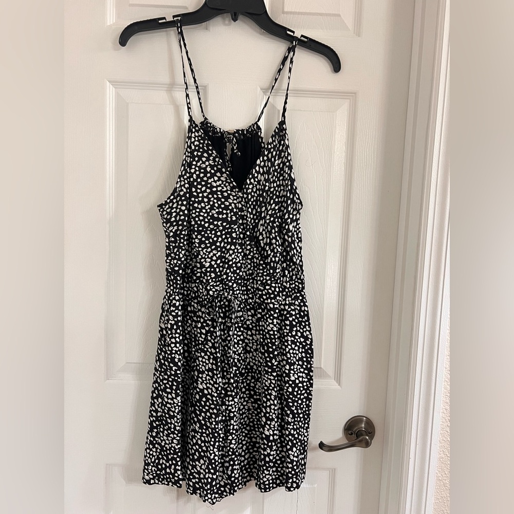 Black and white leopard romper size small